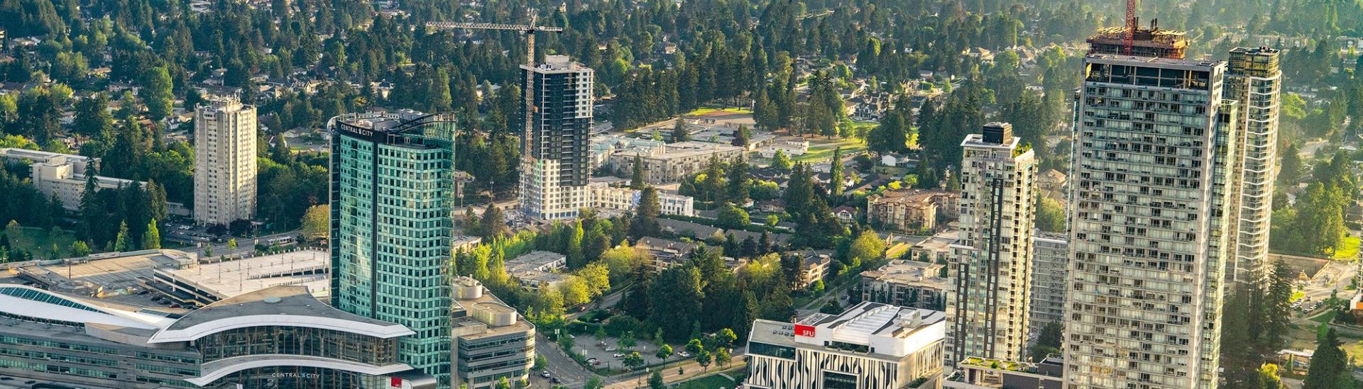 image of SFU amidst downtown buildings in surrey 